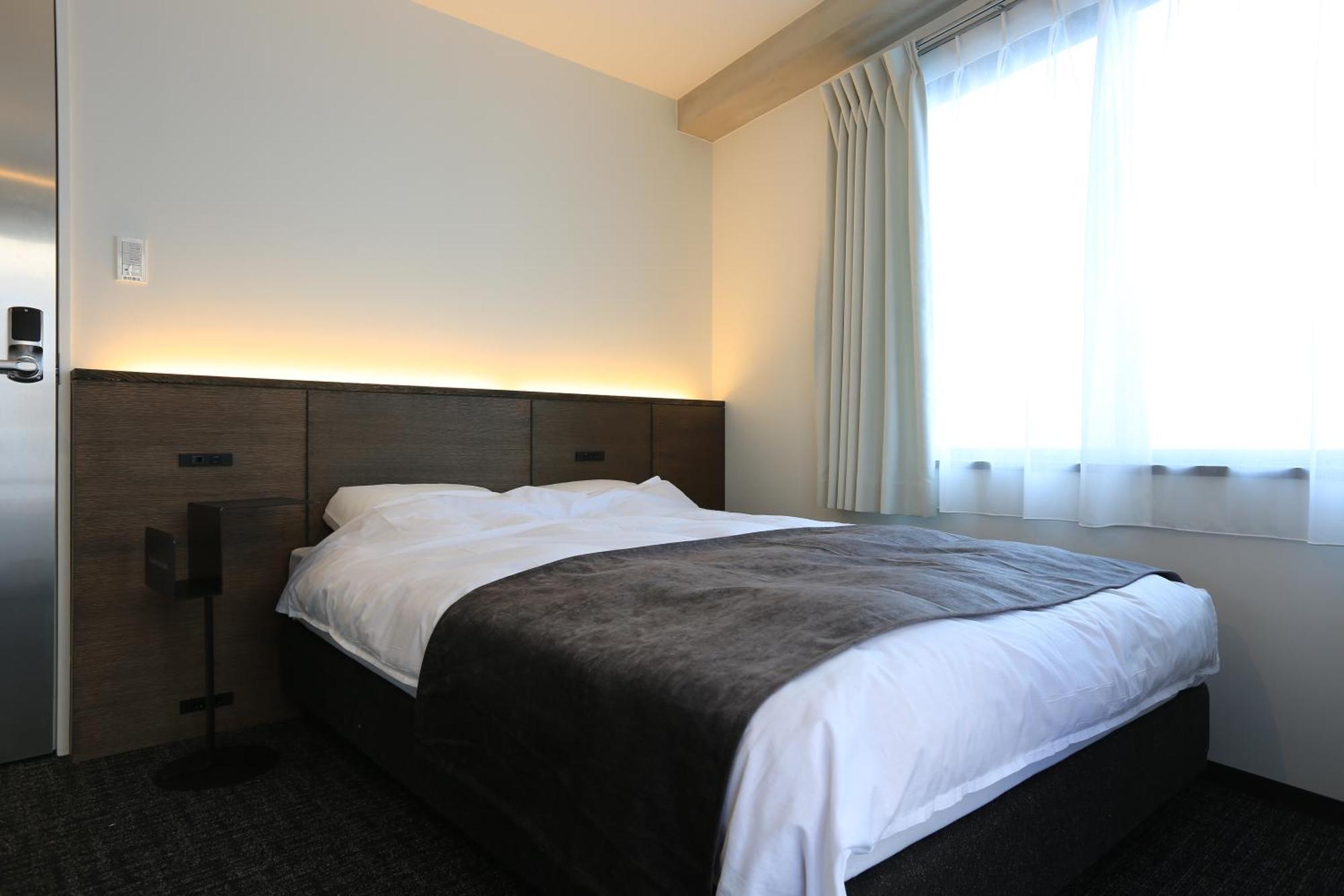 Hostel Unplan Shinjuku Prefektura Tokio Pokoj fotografie